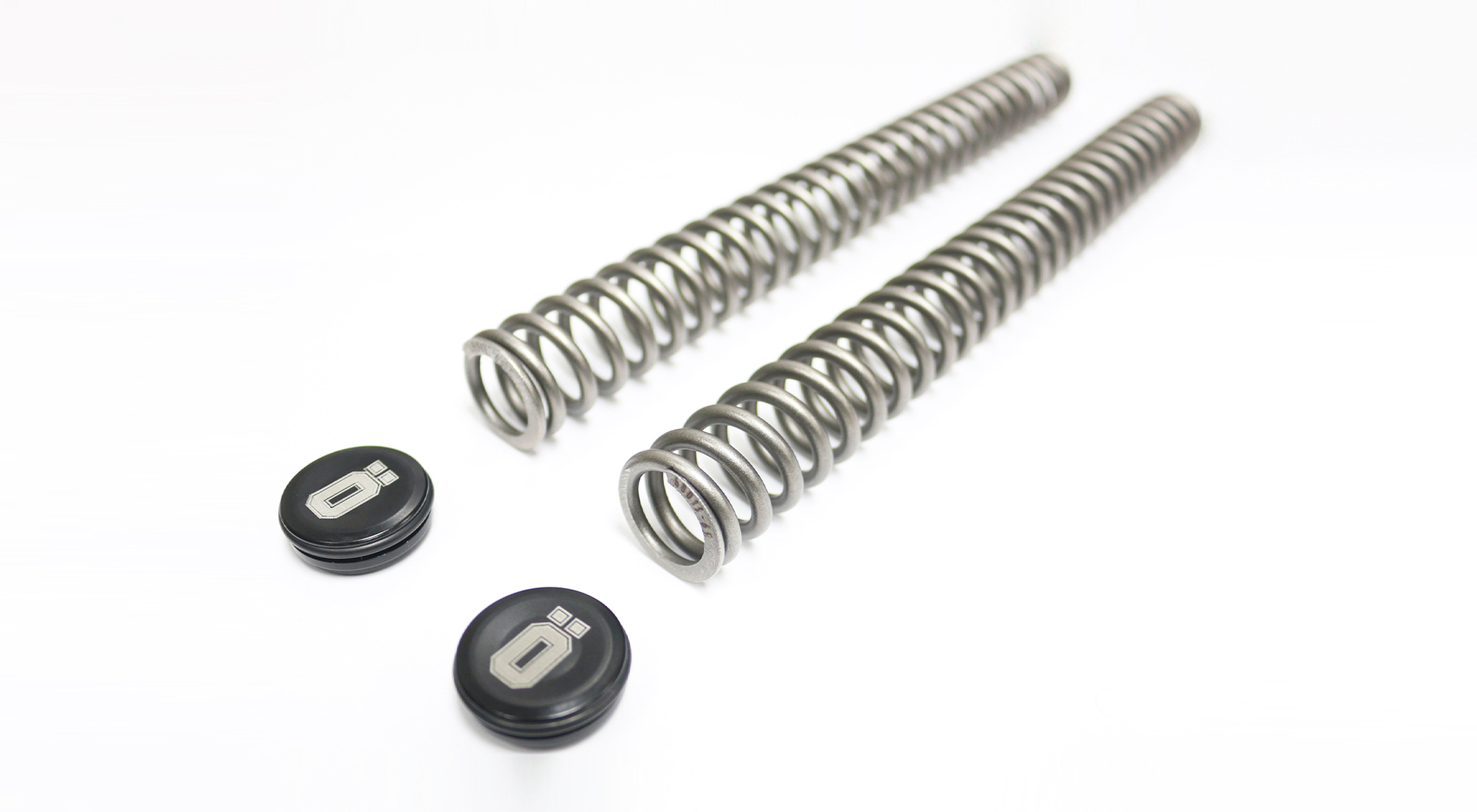 Öhlins front fork spring kit (part no. FSK 142) for Yamaha Grand Filano, featuring featuring performance rate springs and stylishly branded replacement top caps